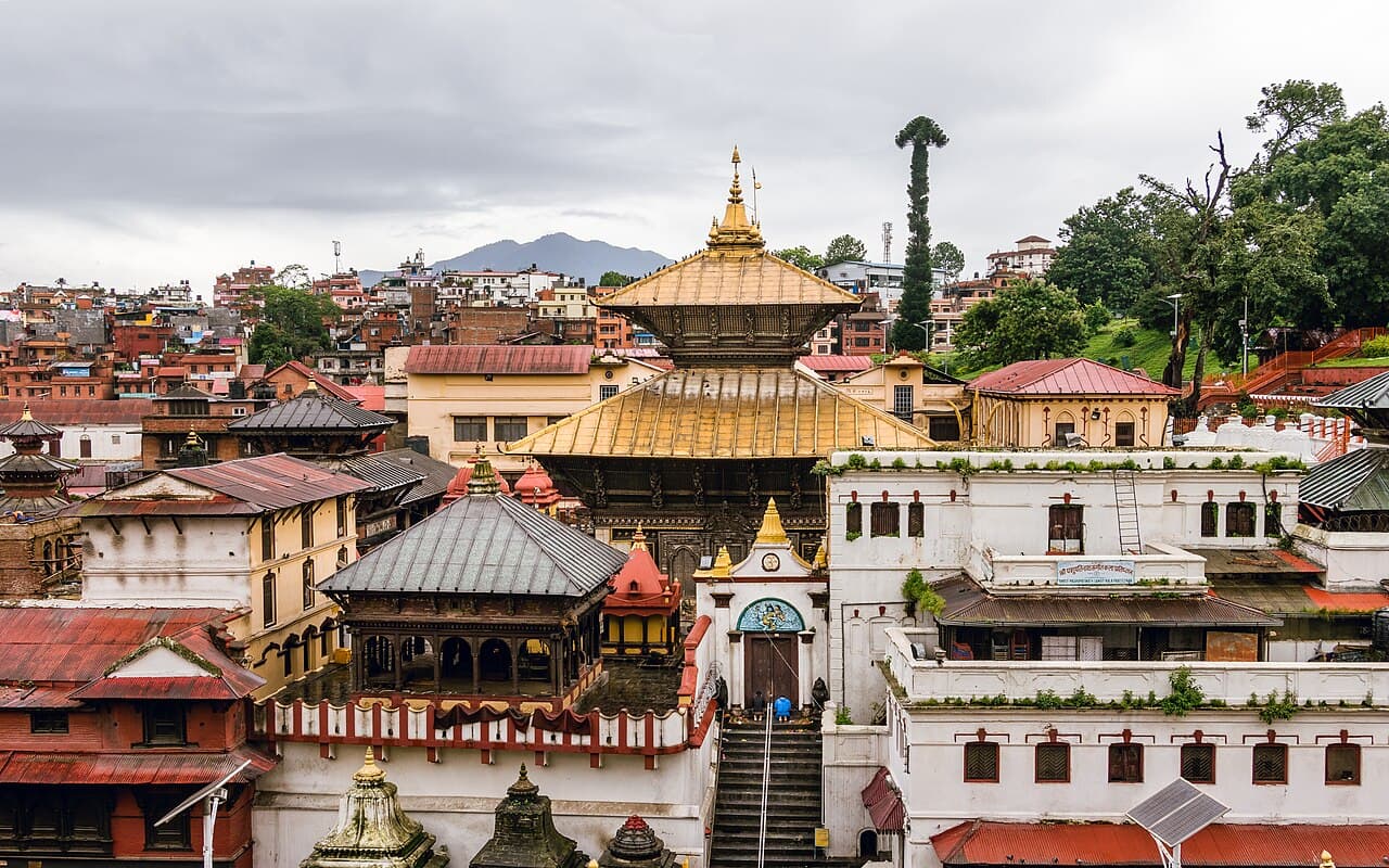 Golden roof of Pashupatinath Temple above its riverside shrines